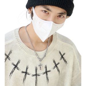 Diamond-studded cross pendant